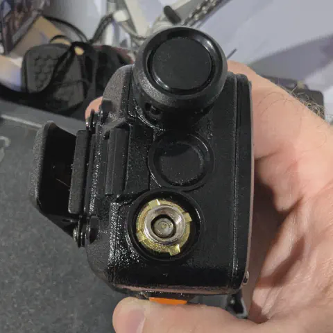 baofeng btech bf f8hp pro top view showing sma m connector without antenna black textured body single control knob smooth indented