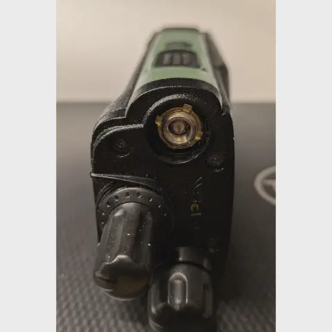 baofeng btech dm 32 uv top view showing sma m connector without antenna black textured body two control knobs