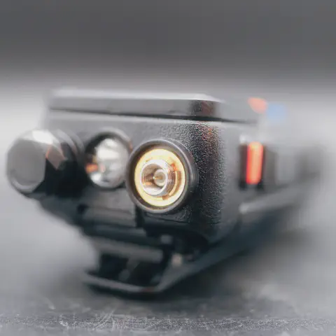 baofeng btech uv 5g plus top view showing sma f connector without antenna black textured body single control knob