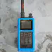 Thumbnail of kenwood th d75a front view with black antenna attached black textured body blue 3d printed case single stacked control knob lcd display control buttons numeric keypad speaker grille
