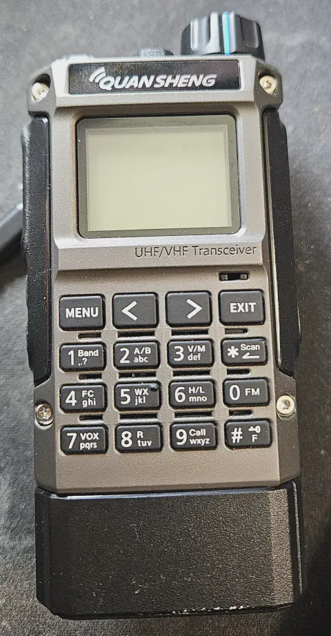 quansheng uv k1 front view without antenna grey and black textured body single control knob lcd display numeric keypad function keys