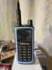 Thumbnail of radioddity gm 30 front view with antenna attached blue and black textured body single control knob lcd display numeric keypad