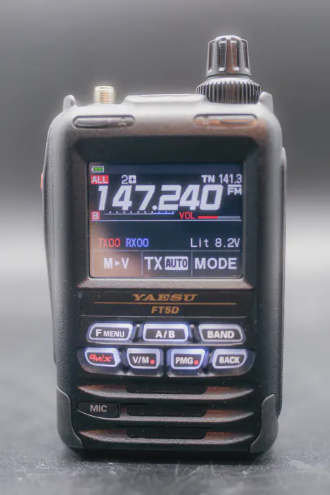 yaesu vertex ft 5dr front view without antenna black textured body single stacked control knob lcd display control buttons speaker grille